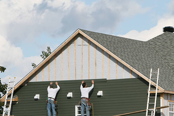 Professional Siding Installation technician working in Breezewood, PA